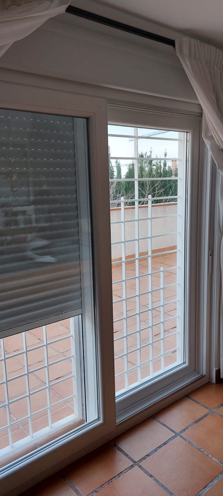 Puerta Pvc elevadora · trabajo de Ventanas Verdún